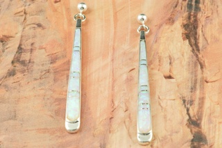 Stunning Fire and Ice Lab Opals inlaid between ribbons of Sterling Silver. Beautiful Sterling Silver Post Earrings feature precision channel inlay. Designed by Navajo Artist Calvin Begay. Signed. 
